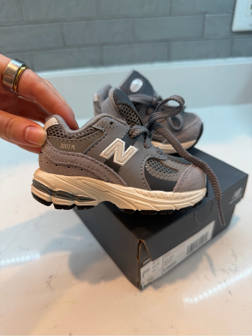 New Balance Kids Gray and White 2002R Athletic Sneakers